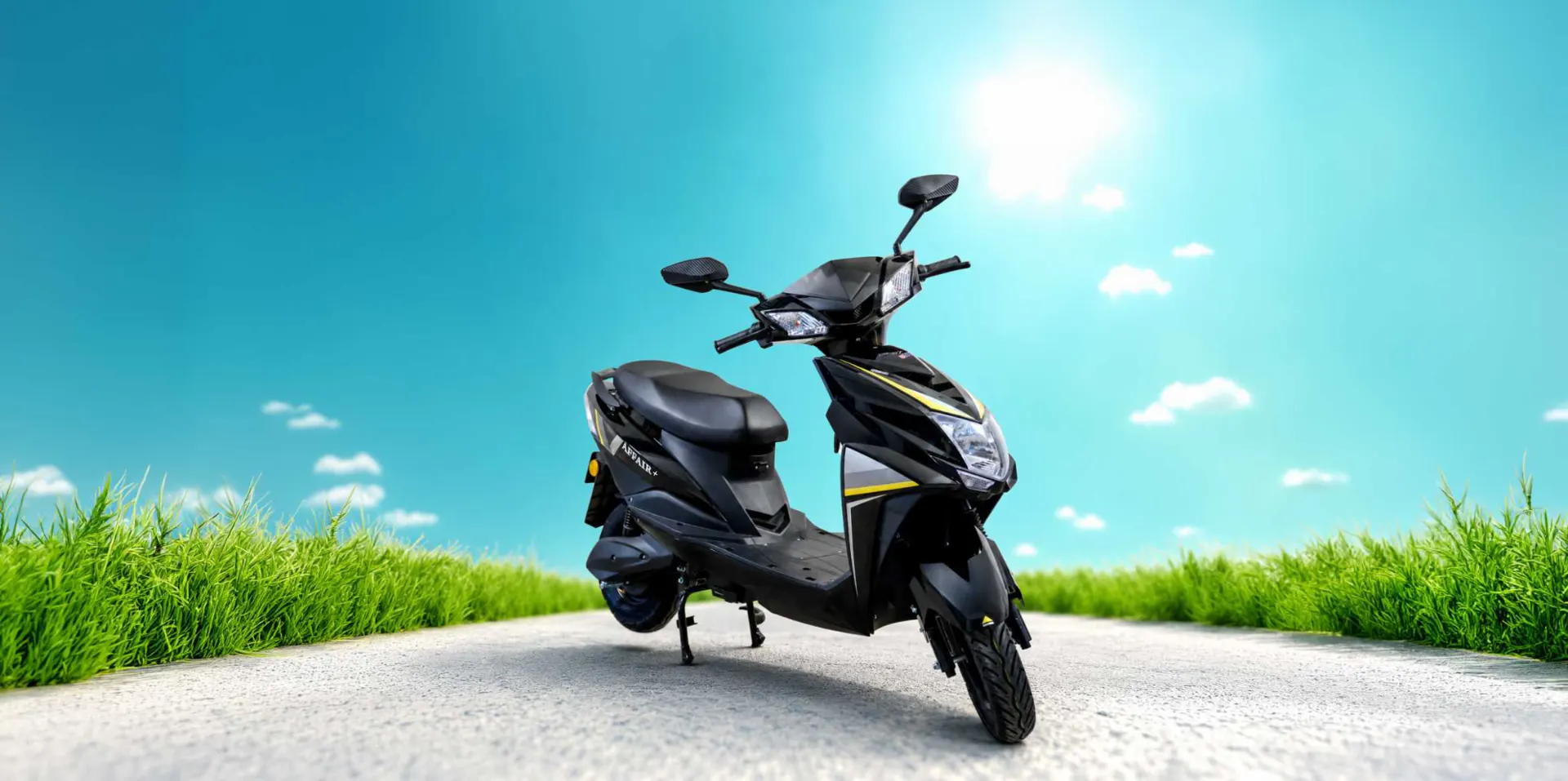 USTROM Affair+ electric scooter on an open road