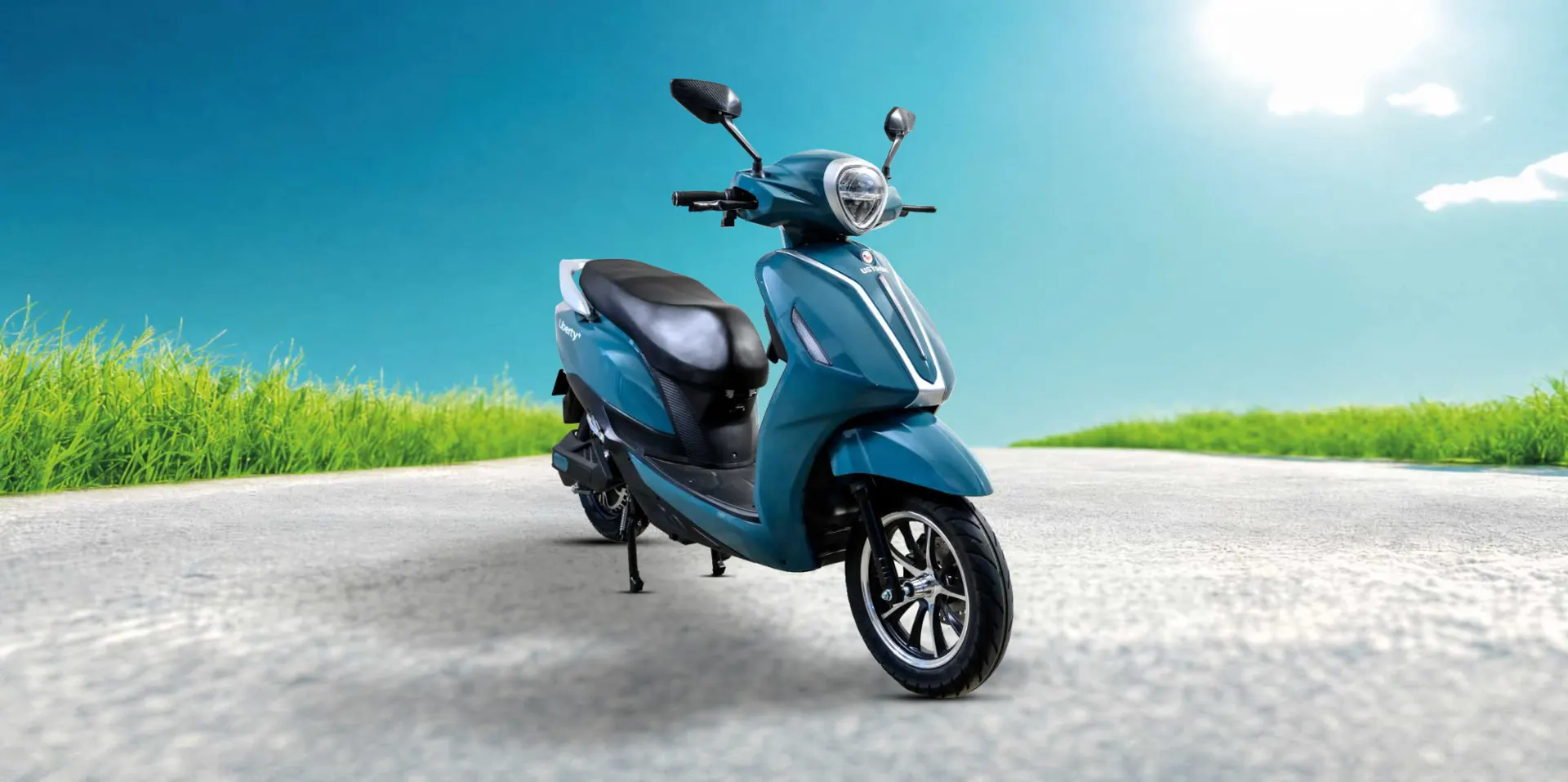USTROM Liberty+ electric scooter on an open road